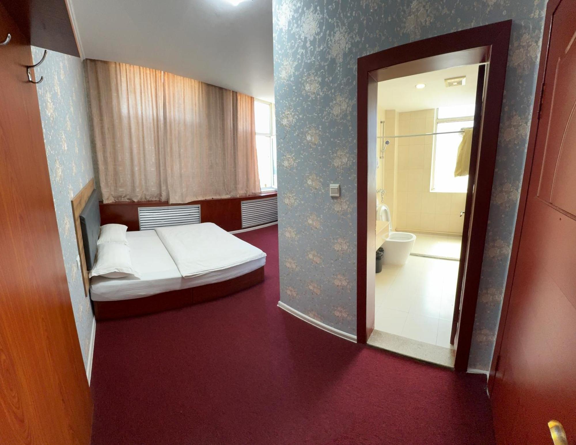 Zolotoi Drakon Hotel Almaty Exterior photo